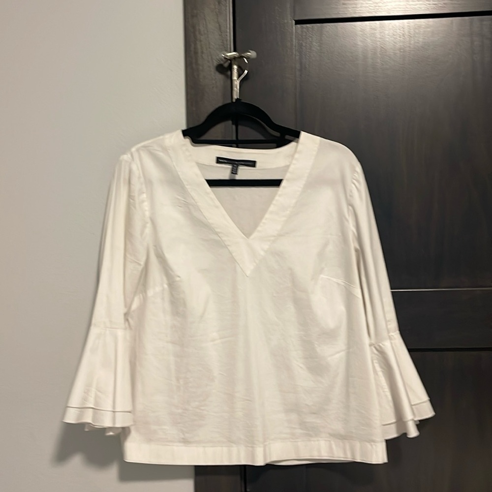 White blouse with bell sleeves
